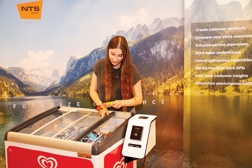 Woman using a digital honesty box