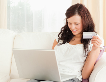 Woman buys in a web shop Woman buys in a web shop small image
