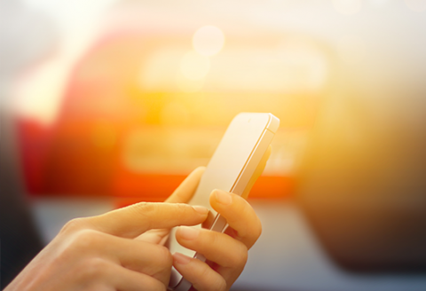 NTS commerce platform for omni-channel retail operations Person using mobile phone
