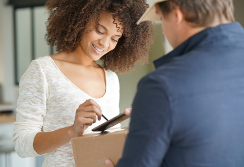 Same day delivery Woman receiving parcel