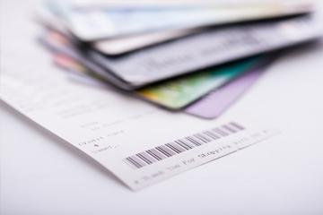 Shopping receipt and credit or debit card Shopping receipt and credit or debit card image small