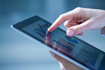 Close-up of hands touching digital tablet with business diagram Close-up of hands touching digital tablet with business diagram image small