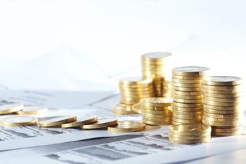 Business diagram on financial report with coins Business diagram on financial report with coins image small